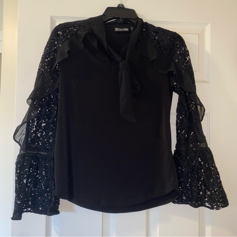 Gorgeous black lacy top with ruffle sleeves